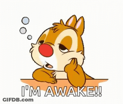 A Cartoon Chipmunk Sitting At A Table With The Words `` I 'M Awake '' Written On It . GIF