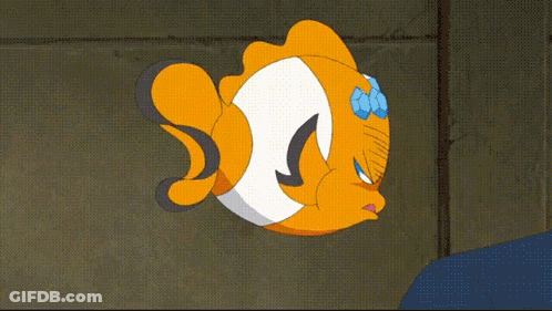 A Cartoon Clown Fish Is Making A Funny Face While Wearing Goggles . GIF