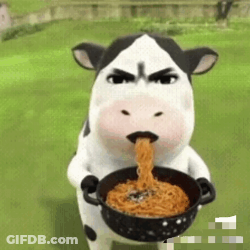 A Cartoon Cow Is Eating Noodles From A Bowl . GIF