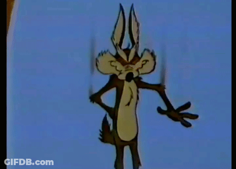A Cartoon Coyote Is Holding A Book Titled The Basic Encyclopedia GIF