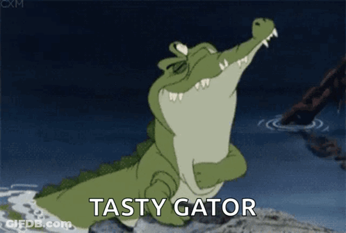 A Cartoon Crocodile Is Standing On A Rock With Its Mouth Open And The Words Tasty Gator Behind It . GIF