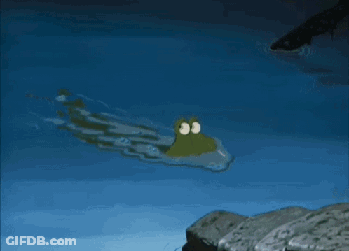 A Cartoon Crocodile Is Swimming In A Body Of Water GIF