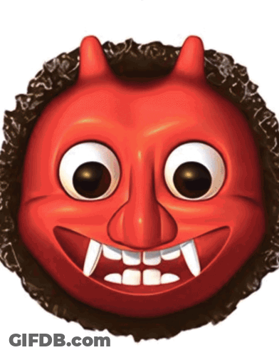 A Cartoon Devil Face With Big Eyes And Fangs GIF