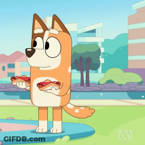 A Cartoon Dog Is Holding A Hot Dog In His Paws GIF