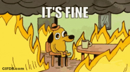 A Cartoon Dog Is Sitting At A Table In Front Of A Fire With The Words " It 'S Fine " Written Above Him GIF