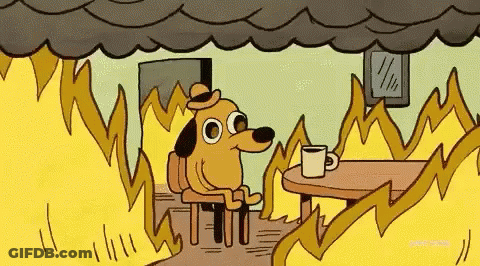 A Cartoon Dog Is Sitting At A Table With A Cup Of Coffee Surrounded By Flames . GIF