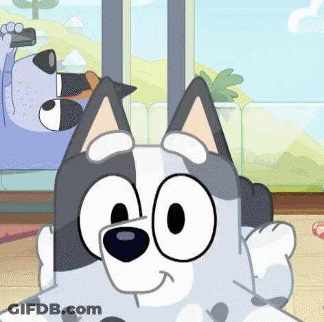 A Cartoon Dog Is Sitting On A Couch Looking At The Camera GIF