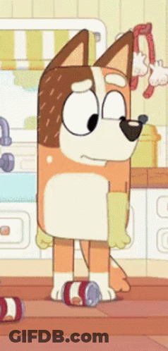A Cartoon Dog Is Standing In A Kitchen Next To A Can Of Soda . GIF