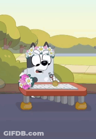A Cartoon Dog With A Flower Crown On His Head GIF