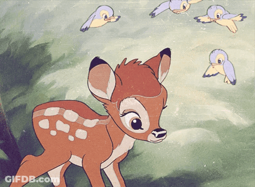 A Cartoon Drawing Of A Baby Deer With Birds Flying In The Background GIF