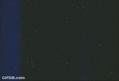 A Cartoon Drawing Of A Blue Object With A Black Background And Stars GIF