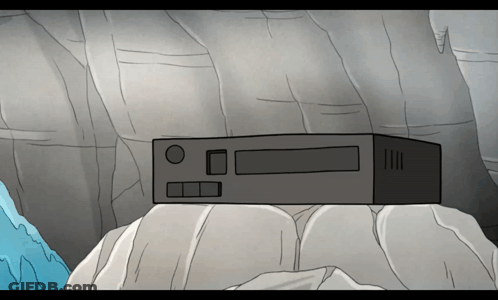 A Cartoon Drawing Of A Box Sitting On Top Of Some Rocks GIF
