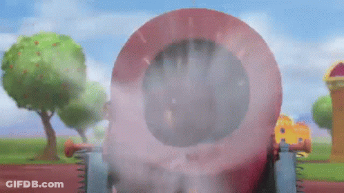 A Cartoon Drawing Of A Cannon With Smoke Coming Out Of It In A Park . GIF