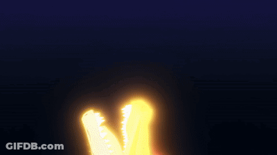 A Cartoon Drawing Of A Dragon With Its Mouth Open And Glowing In The Dark GIF
