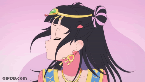 A Cartoon Drawing Of A Girl With Black Hair And Earrings GIF