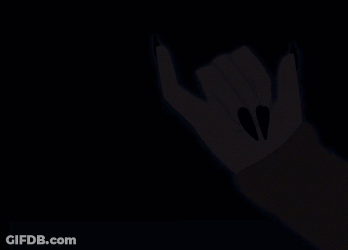 A Cartoon Drawing Of A Hand With Black Nails Making A Devil Horns Sign GIF