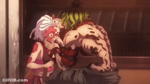 A Cartoon Drawing Of A Man With A Red Face And A Woman With White Hair GIF