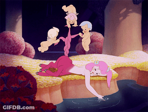 A Cartoon Drawing Of A Mermaid Laying On A Rock Near A Body Of Water GIF