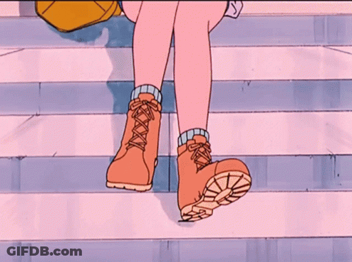 A Cartoon Drawing Of A Person 'S Feet Wearing A Pair Of Brown Boots GIF