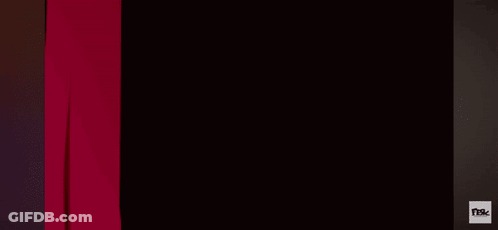 A Cartoon Drawing Of A Purple Monster With Yellow Eyes And Horns GIF
