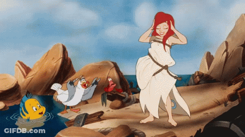 A Cartoon Drawing Of A Woman In A White Dress GIF
