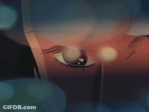 A Cartoon Drawing Of A Woman 'S Eye With A Blue Background GIF