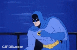 A Cartoon Drawing Of Batman In A Blue Cape GIF