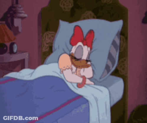 A Cartoon Drawing Of Daisy Duck Laying In Bed GIF