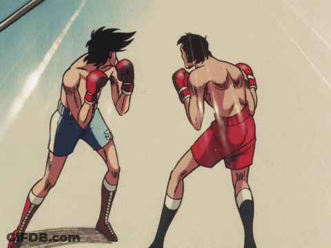 A Cartoon Drawing Of Two Boxers One Of Whom Is Wearing Shorts With The Letter G On Them GIF