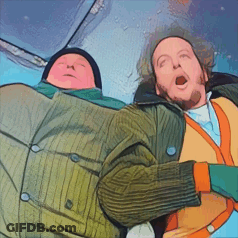 A Cartoon Drawing Of Two Men Laying Down With One Yawning GIF