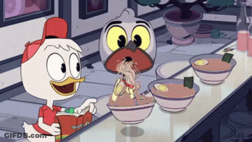 A Cartoon Duck Is Reading A Book While Eating Noodles GIF