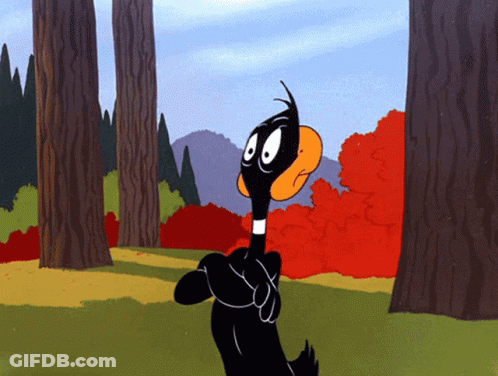A Cartoon Duck Is Standing In A Forest GIF