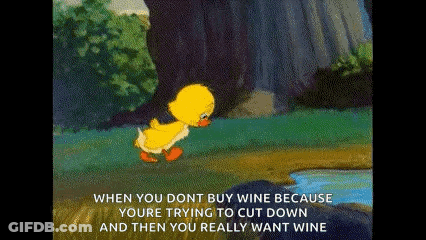 A Cartoon Duck Is Walking Across A Grassy Field Near A River . GIF