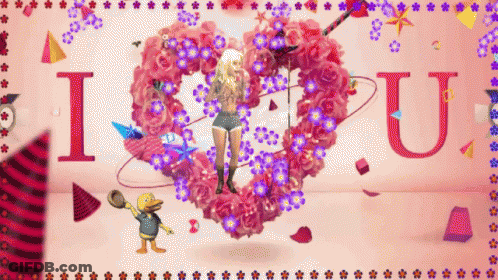 A Cartoon Duck Stands In Front Of A Heart That Says I Love U GIF