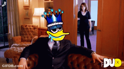 Crowned Cartoon Duck Sitting On Couch GIF