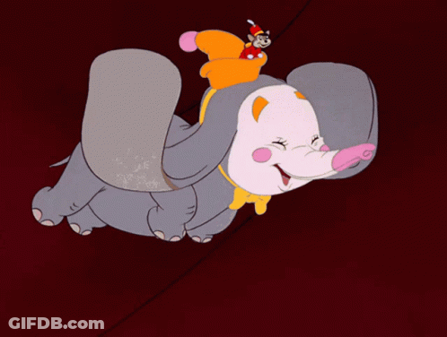 A Cartoon Elephant Is Flying Through The Air With A Mouse On Its Back GIF