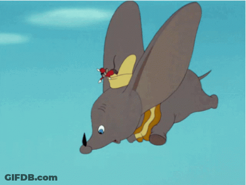 A Cartoon Elephant Is Flying Through The Air With Mickey Mouse Riding On Its Back GIF