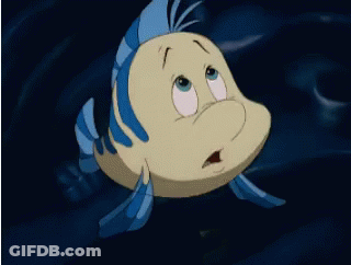 Sad Face Cartoon Fish Swimming In Water GIF