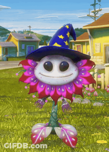 A Cartoon Flower Wearing A Blue And Yellow Witch Hat GIF