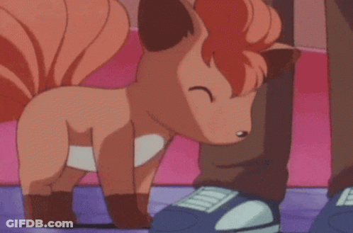 Cartoon Fox Smiling Next To Person's Feet GIF