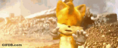 A Cartoon Fox Is Standing On Top Of A Pile Of Dirt In The Desert . GIF