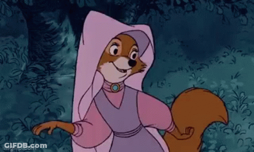 A Cartoon Fox Wearing A Pink Robe And A White Hood Is Standing In A Forest . GIF