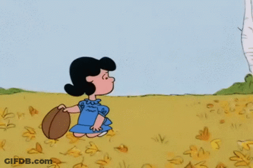 A Cartoon Girl In A Blue Dress Is Kneeling In A Field Holding A Bag GIF