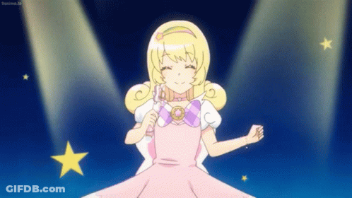 A Cartoon Girl In A Pink Dress Is Dancing On A Stage GIF