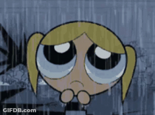 A Cartoon Girl Is Crying In The Rain GIF