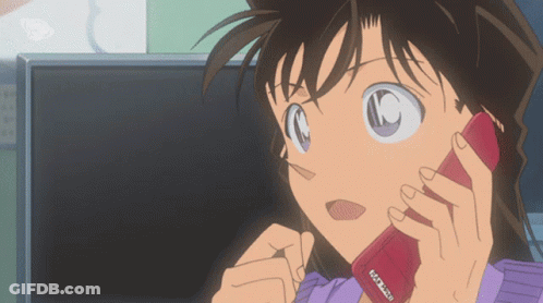 A Cartoon Girl Is Talking On A Red Phone That Says Hitachi GIF