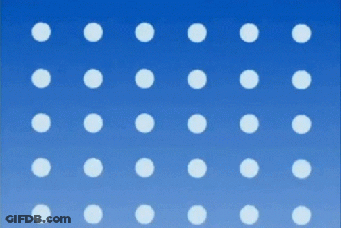 A Cartoon Girl Is Wearing A Blue Hat With White Polka Dots On It . GIF