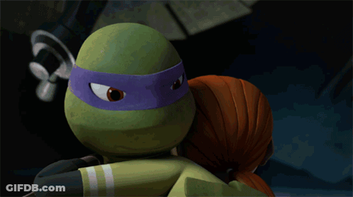 A Cartoon Girl Kissing A Turtle With A Purple Headband GIF