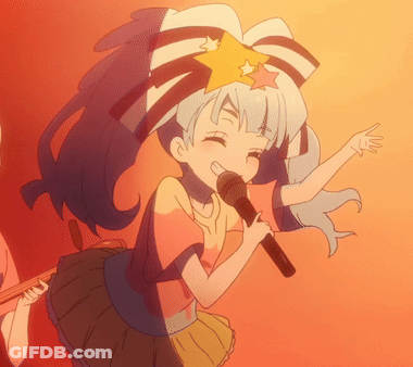 A Cartoon Girl Singing Into A Microphone With A Star On Her Head GIF
