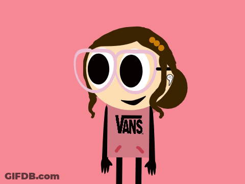 A Cartoon Girl Wearing A Vans Shirt Holds A Cell Phone GIF
